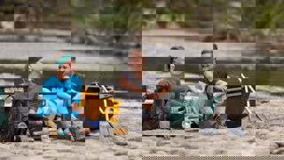Couple having lunch by canoe on the Whanganui River Journey - Visit Ruapehu.jpg